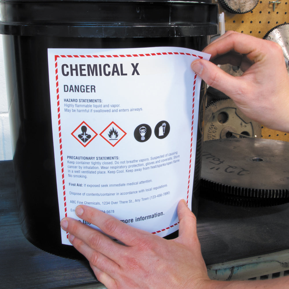 VynMark™ Adhesive Printable Supplier Laser Labels being applied to a drum