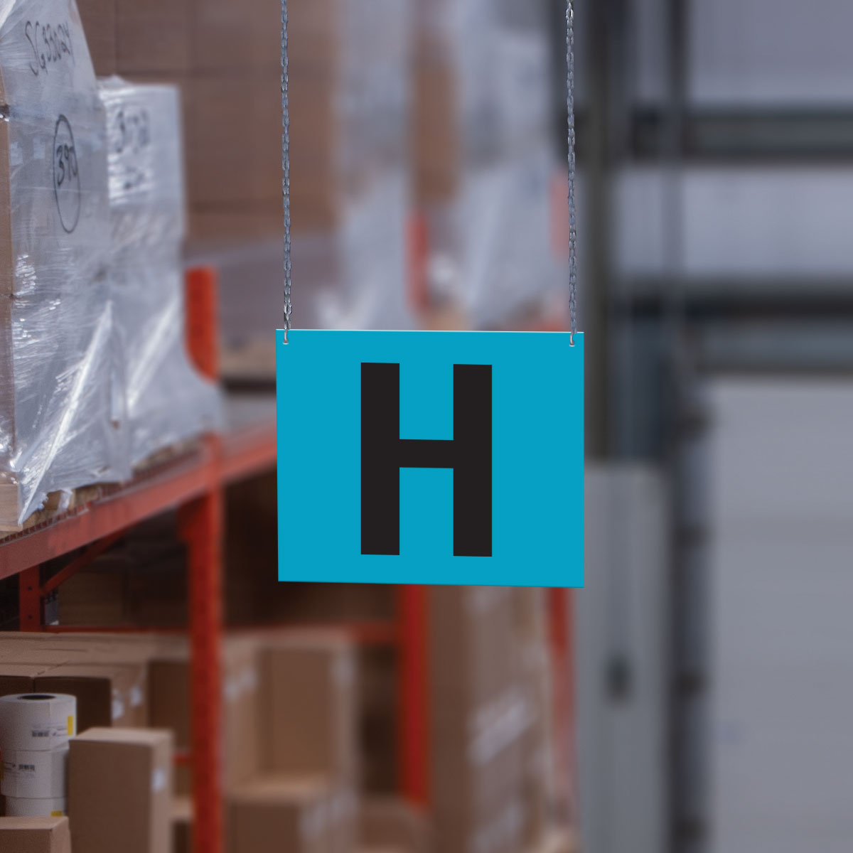 Heavy Duty Warehouse Aisle Location Signs (12 in x 10 in) Consecutively Lettered (10 /pkg) hanging from the ceiling